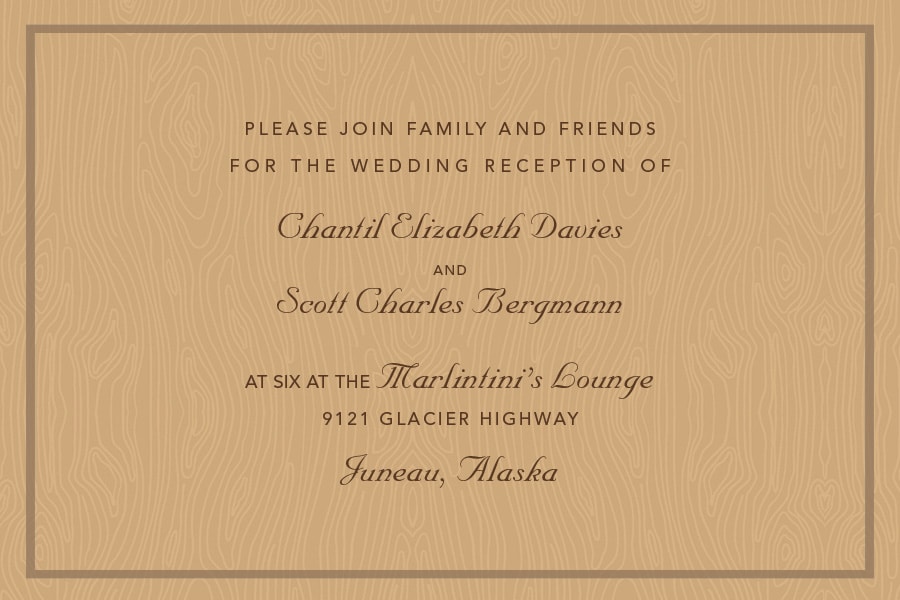 Reception invitation in script lettering on a light wood-grain background.