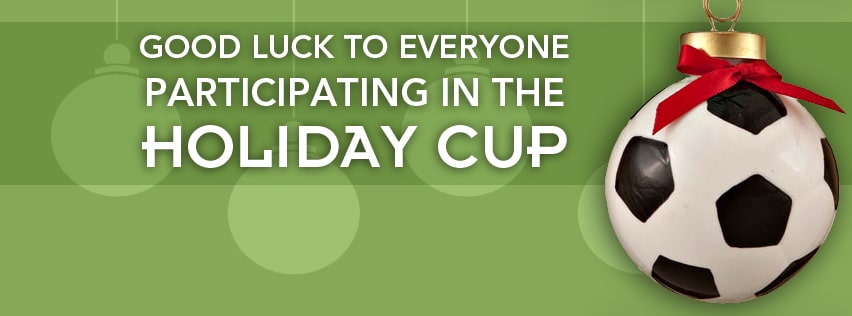 Green banner wishing good luck to everyone in the Holiday Cup, with a soccer ball ornament.