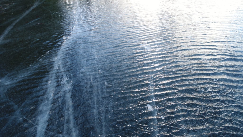 Rippled dark water at the edge of the ice