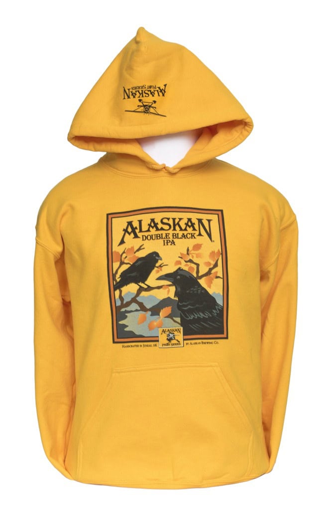 Gold Alaskan Double Black IPA hoodie with two ravens in autumn branches printed on the front, on a mannequin.