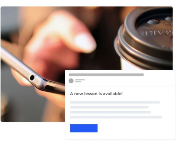 Smartphone with coffee cup for online learning.