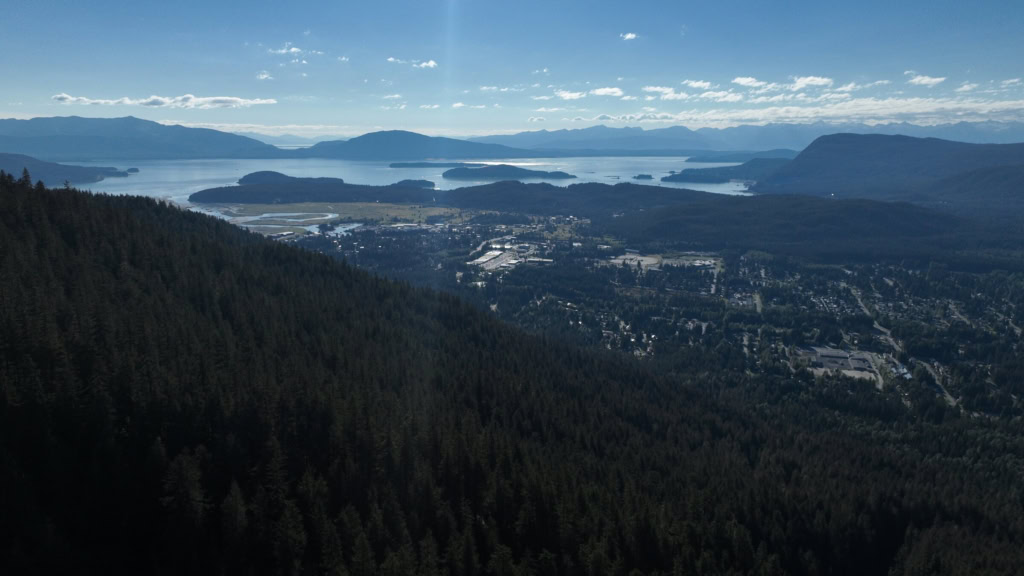 Wide view over the Mendenhall Valley toward islands and open water